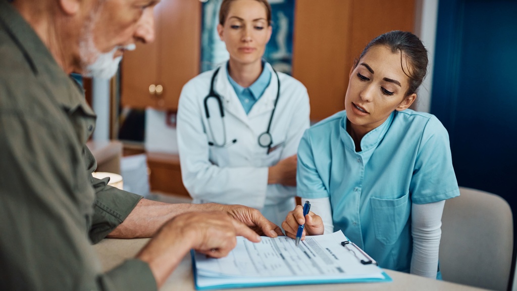 Photo of healthcare providers and patient